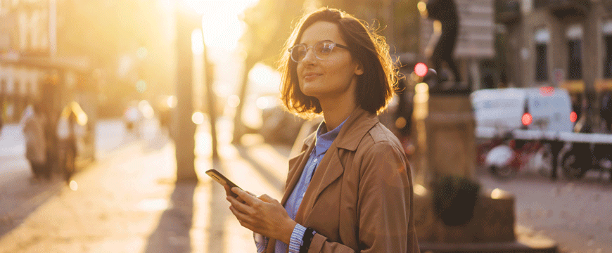 Girl in a Park with her Phone