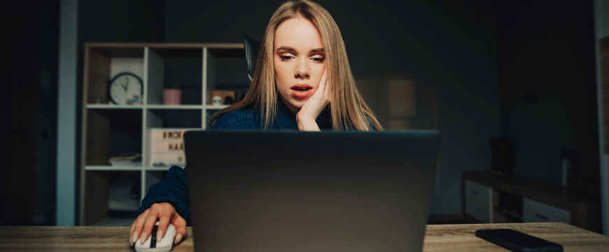 Girl Looking at a Computer Screen Confused